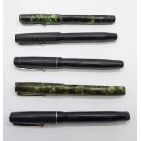 Five Mabie Todd pens, three Blackbird and two Swan, all with 14ct gold nibs