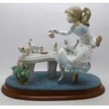 A Lladro figure, 6109, Meal Time, with base, 12.5cm