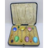 A cased set of six silver and enamel coffee bean spoons, Birmingham 1937, Turner & Simpson, hinge of