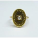 A yellow metal and diamond ring, tests as 14/15ct gold, 4.3g, P, (ring top approximately 13mm x