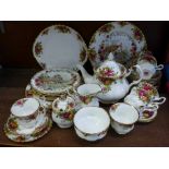 A Royal Albert Old Country Roses six setting tea service with teapot, cream jug, sugar, six cups,