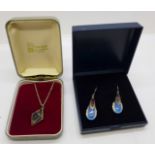 A silver and Blue John pendant and chain and a pair of silver and moonstone earrings