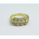 An 18ct gold and diamond cluster ring, approximately 0.90carat diamond weight, 4.2g, M/N