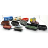 Twelve OO gauge railway wagons including nine Hornby