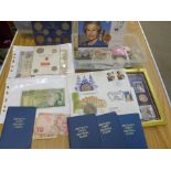 A collection of mixed coins and banknotes