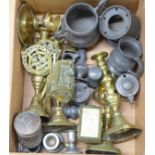 A pair of brass candlesticks, a Chinese copper lidded pot, two brass caskets and other brass and