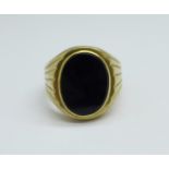 A gentleman's 9ct gold and onyx ring, 7.2g, W, inner shank personalised, onyx approximately 12mm x