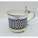 A pierced silver mustard with blue glass liner, small chips on rim of liner, Sheffield 1908, 77g