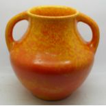 A Royal Lancastrian Arts & Crafts two handled orange flambe vase, impressed marks to base, 18.5cm