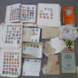 Two albums of stamps, a box of stamps and stamps on loose album pages and envelopes