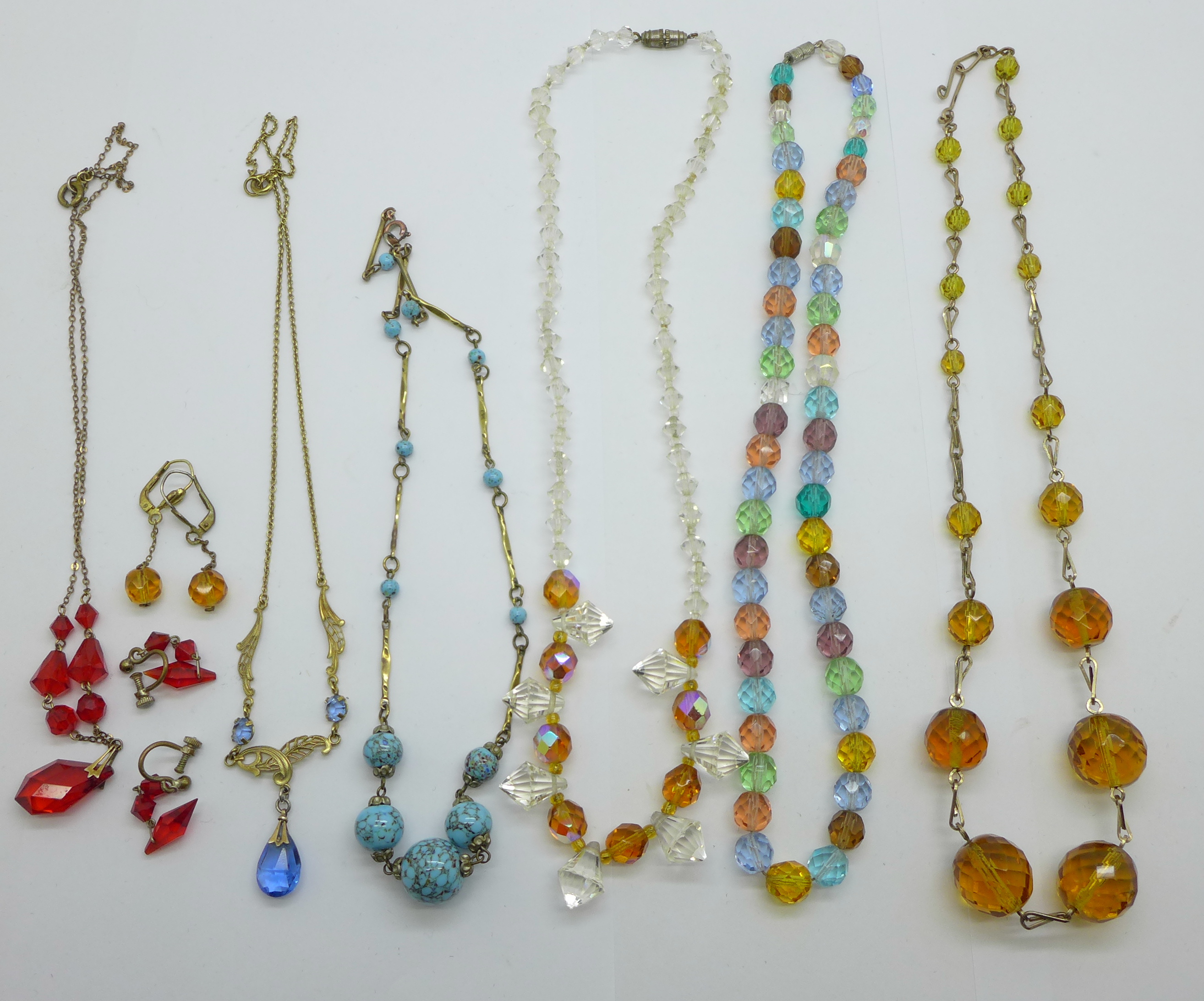 Six necklaces including Art Deco and two pairs of earrings, (one chain requires repair)