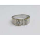 An 18ct white gold and four stone diamond ring, 6.8g, Q