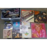 A box of LP records and 7" singles; 2 x The Beatles, Status Quo and other rock music, mainly 1980's