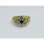 A 9ct gold, sapphire and diamond cluster ring, 3.4g, N