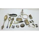 A collection of silver items, etc., including a Brandy label, a pepper, a matchbox holder, a P & O