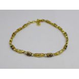 A silver gilt bracelet set with smoky quartz