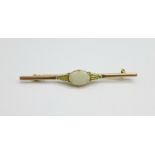 A 9ct gold and opal brooch, 2.7g, opal approximately 6mm x 9mm