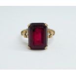 A 9ct gold and red stone ring, 4.9g, P