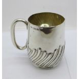 A Victorian silver mug, Sheffield 1891, Walker & Hall, 147g, (rim slightly out of shape)
