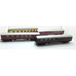 Four OO gauge Hornby railway carriages