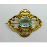 A Victorian gilt metal and blue stone brooch