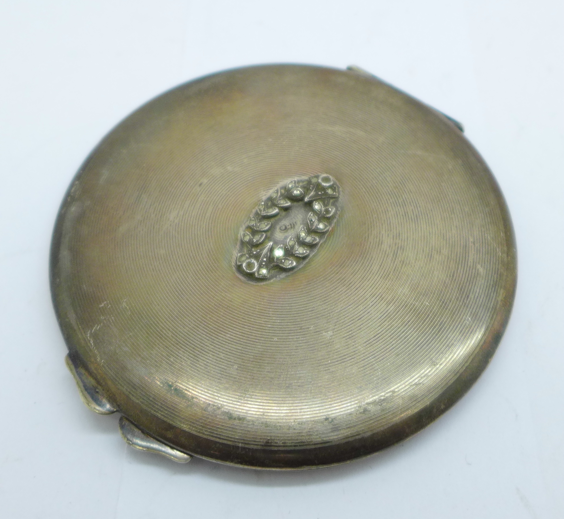 A silver compact, lacking some marcasite, 96g