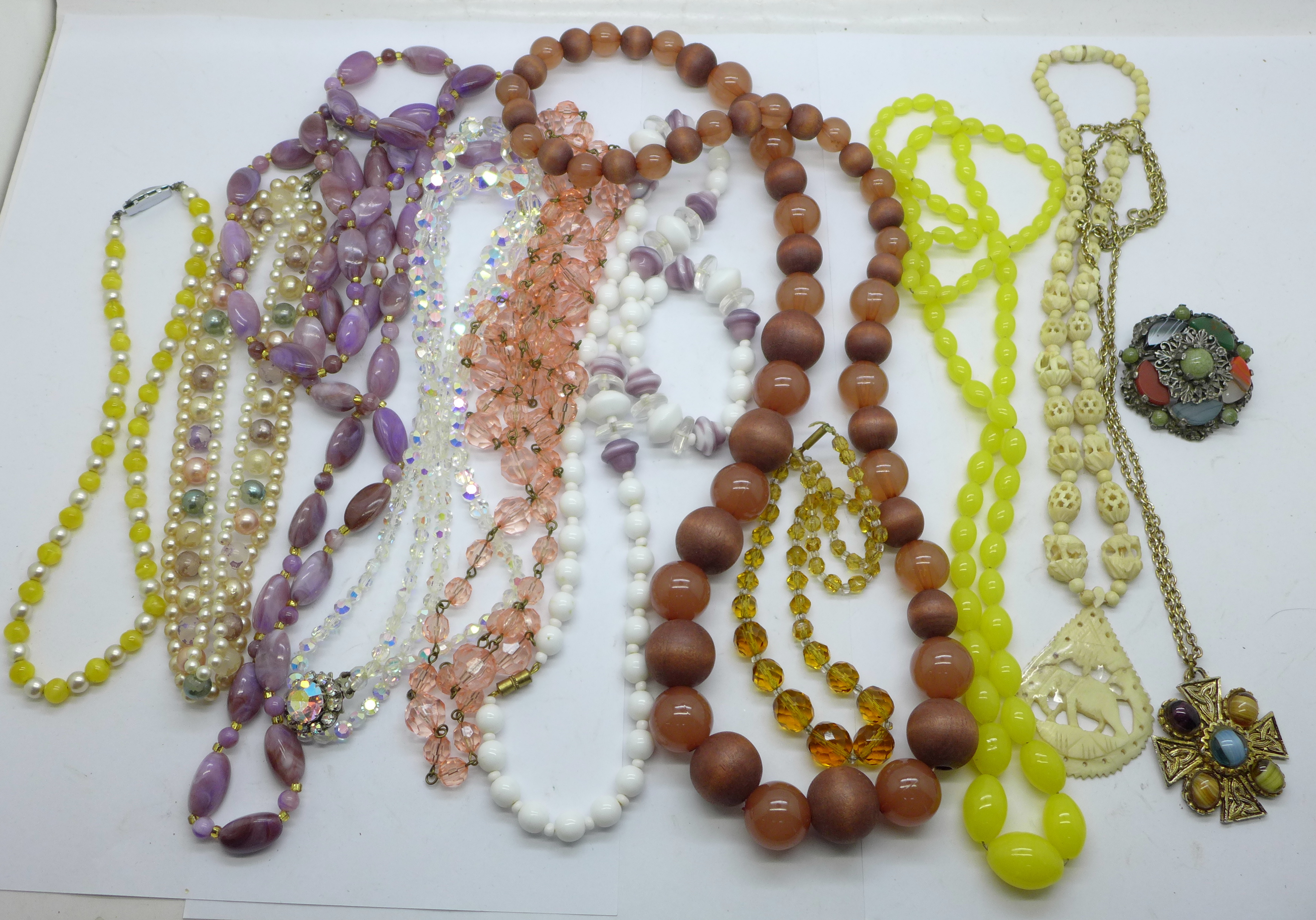 Bead necklaces, necklets and brooches