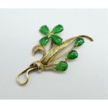 A 14ct gold and green stone pendant, 5.3g, height 5cm