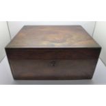 A 19th Century rosewood travelling box with Bramah lock, width 31cm, (with some contents including