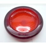 A Whitefriars ruby glass dish with controlled bubble decoration