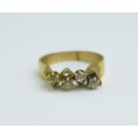 A 9ct gold and four stone ring, 3.1g, M