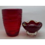 A Whitefriars ruby red glass controlled bubble bowl and a red glass vase