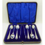 A cased set of six silver teaspoons and a pair of silver sugar bows, 108g