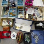 A box of costume jewellery and wristwatches