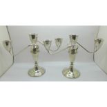 A pair of silver weighted candlesticks/candelabra, total weight 1,138g, Duchin Creation, USA, height