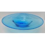 A large blue glass bowl or centrepiece, 42.5cm