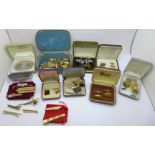 Thirty pairs of cufflinks and twelve tie-pins