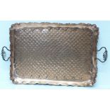 A hand beaten copper two handled tray, 51cm