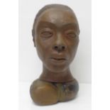 A terracotta bust of a lady on a wooden base, 31.5cm