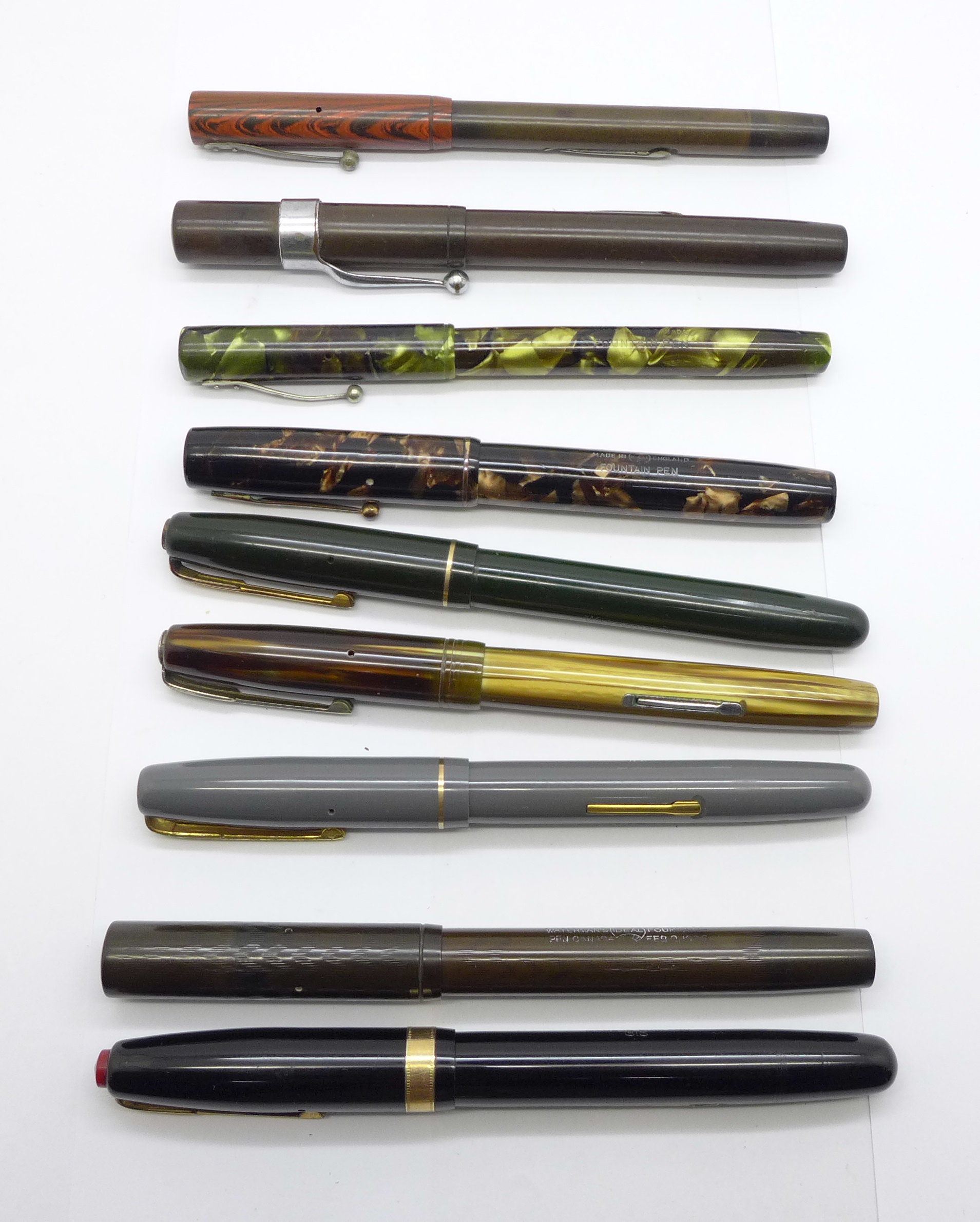Nine Waterman pens, including no. 502, no.515 and W2, seven with marked 14ct gold nibs, (one with