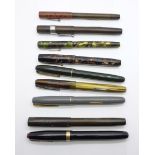 Nine Waterman pens, including no. 502, no.515 and W2, seven with marked 14ct gold nibs, (one with