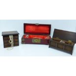 Three wooden jewellery boxes; a Chinese box with carved green soapstone discs set in the lid with