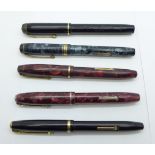 Five Conway Stewart pens; no.70, no.15, no.388, no.286 and no.12, all with 14ct gold nibs