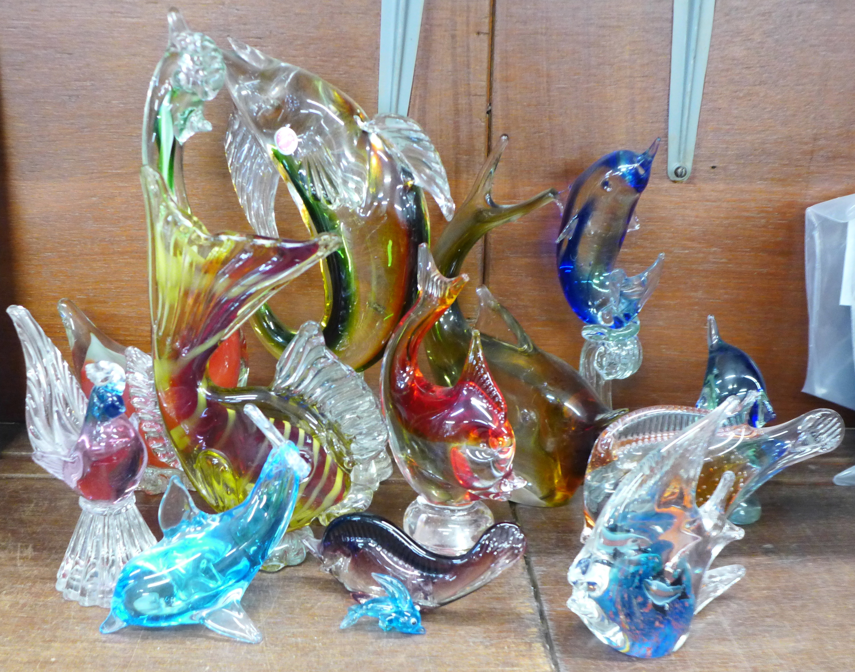 Twelve items of Murano glass including fish, dolphins, etc.