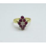 An 18ct gold, ruby and white stone ring, 3.2g, L/M