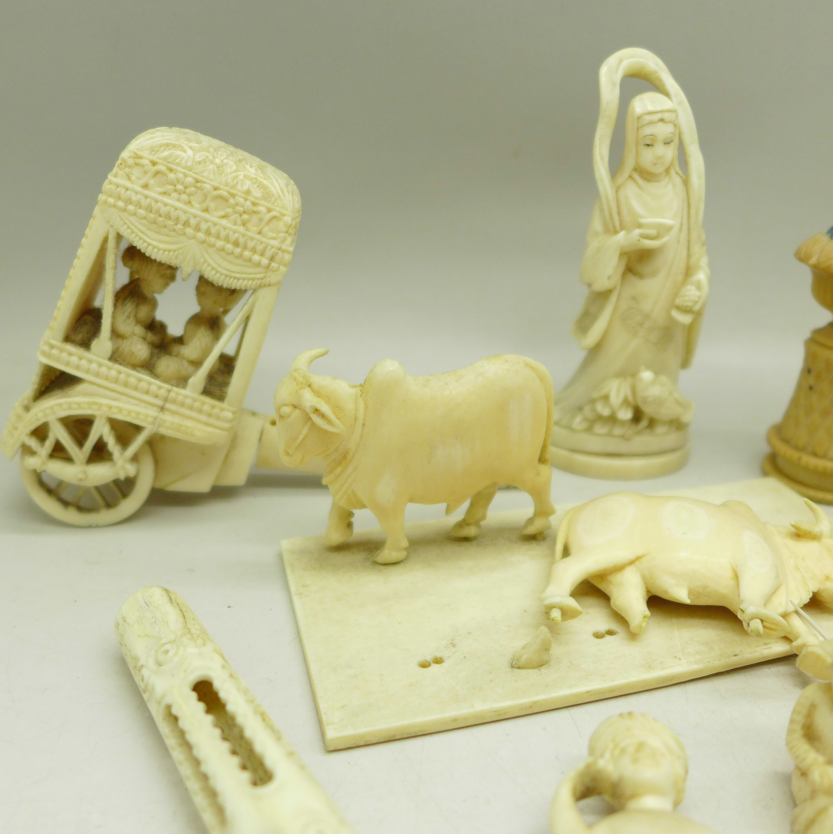 An early 20th Century carved ivory figure, a/f, a carved carriage with two figures, other carved - Image 2 of 7