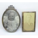 Two silver photograph frames, oval frame 150mm x 112mm, rectangular frame lacking back stand