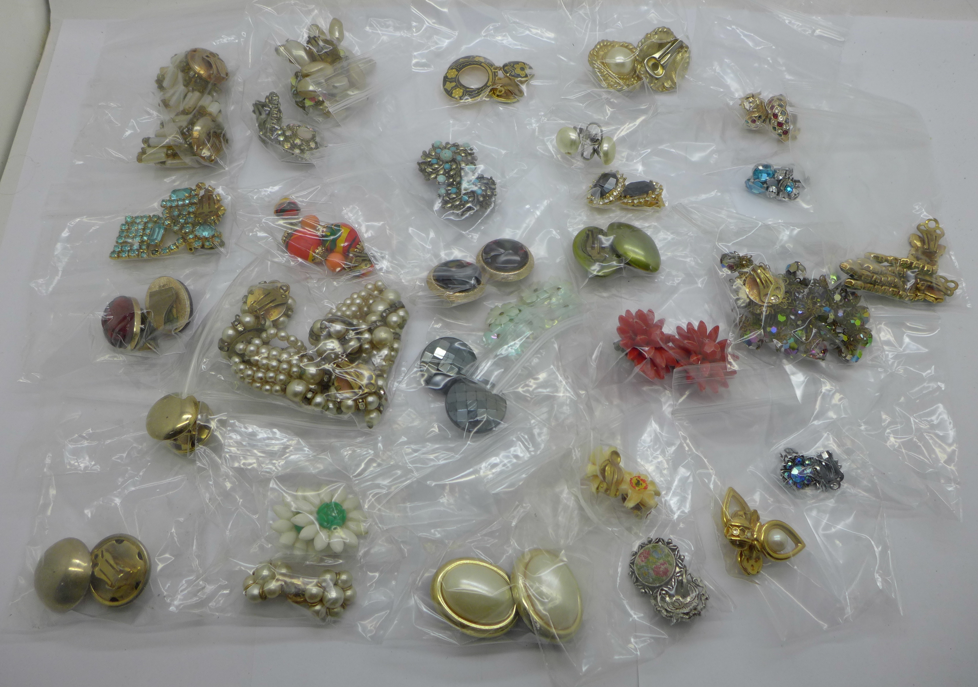 Thirty pairs of clip-on earrings