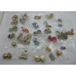 Thirty pairs of clip-on earrings
