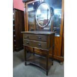 An Edward VII Waring & Gillows mahogany dressing table, 138cms h x 61cms w